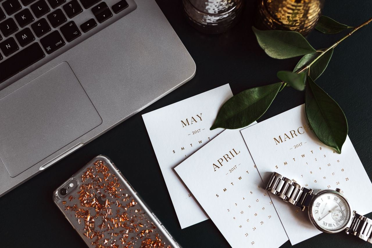 Calendar and laptop used to track prior authorization deadlines